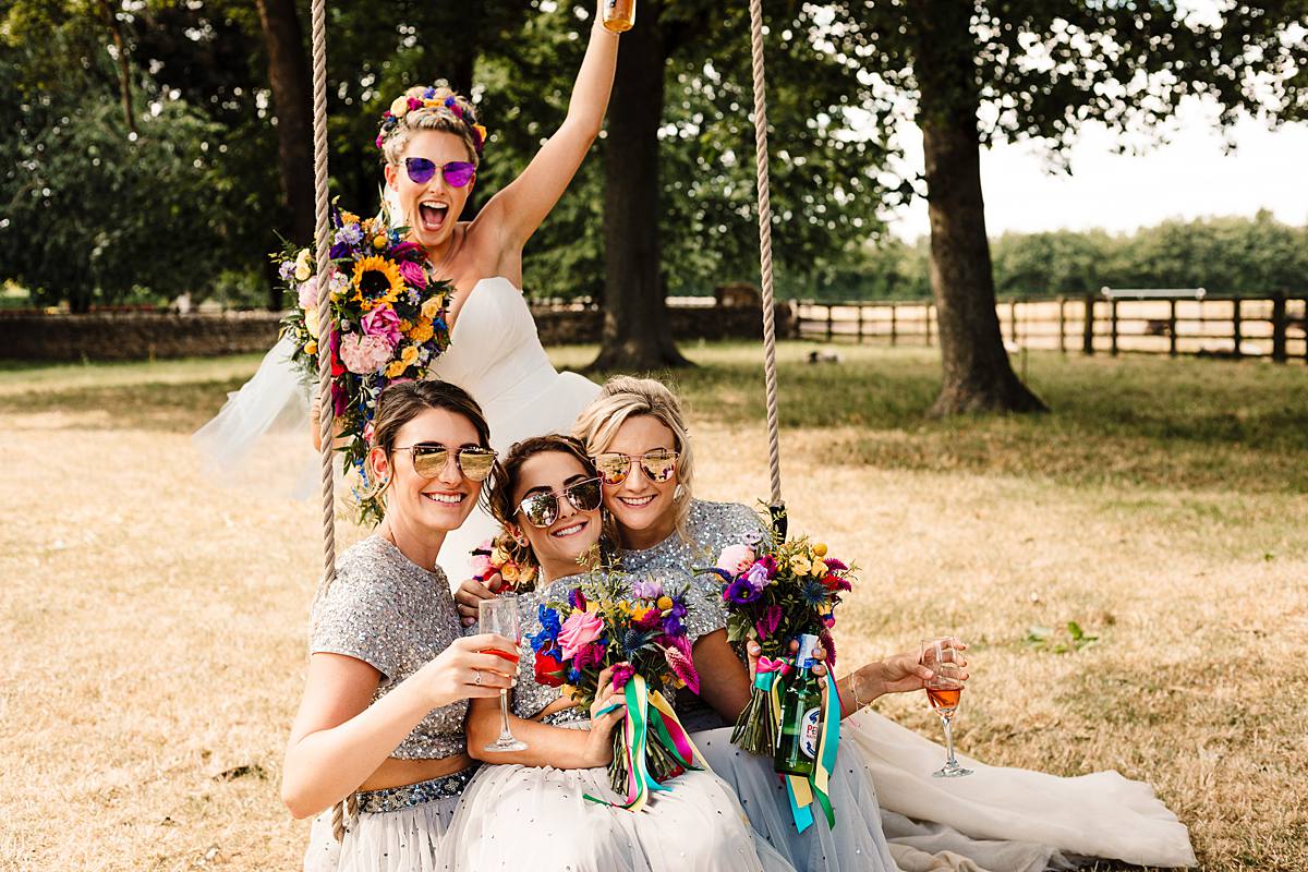 Mr and Mrs Unique, Tipi Wedding, Bright Wedding, DIY Wedding, Doncaster Wedding, Outdoor Wedding, Hip to Heart Photography, Pom Poms, Open Tipi, Giant Tipi, Flower Crowns, Vodka Jelly Shots, Fun Wedding, Sparkly Wedding Dress, Festival Style Wedding, Wedding Party, Sunflowers, Sunflower Bouquet, Church Wedding, Dogs, Sparkly Heels, Bridal Shows, Colourful Confetti, Loversall Farm,Yorkshire Wedding