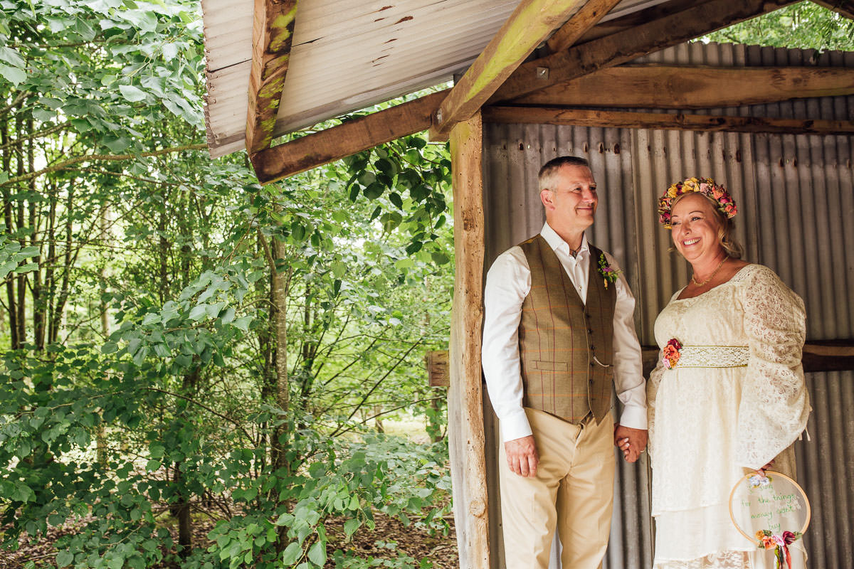 abbey home organic farm, farm wedding, festival bride, festival wedding, floral crown, Florence fox photography, neon gift, Neon Lighting, organic farm, organic food, outdoor wedding, relaxed wedding, tractor, woodland wedding