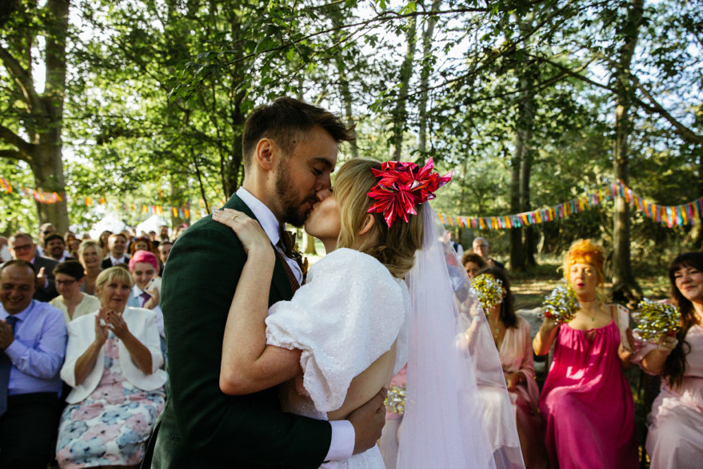 Acid-bright barn wedding in the woods,  Sussex